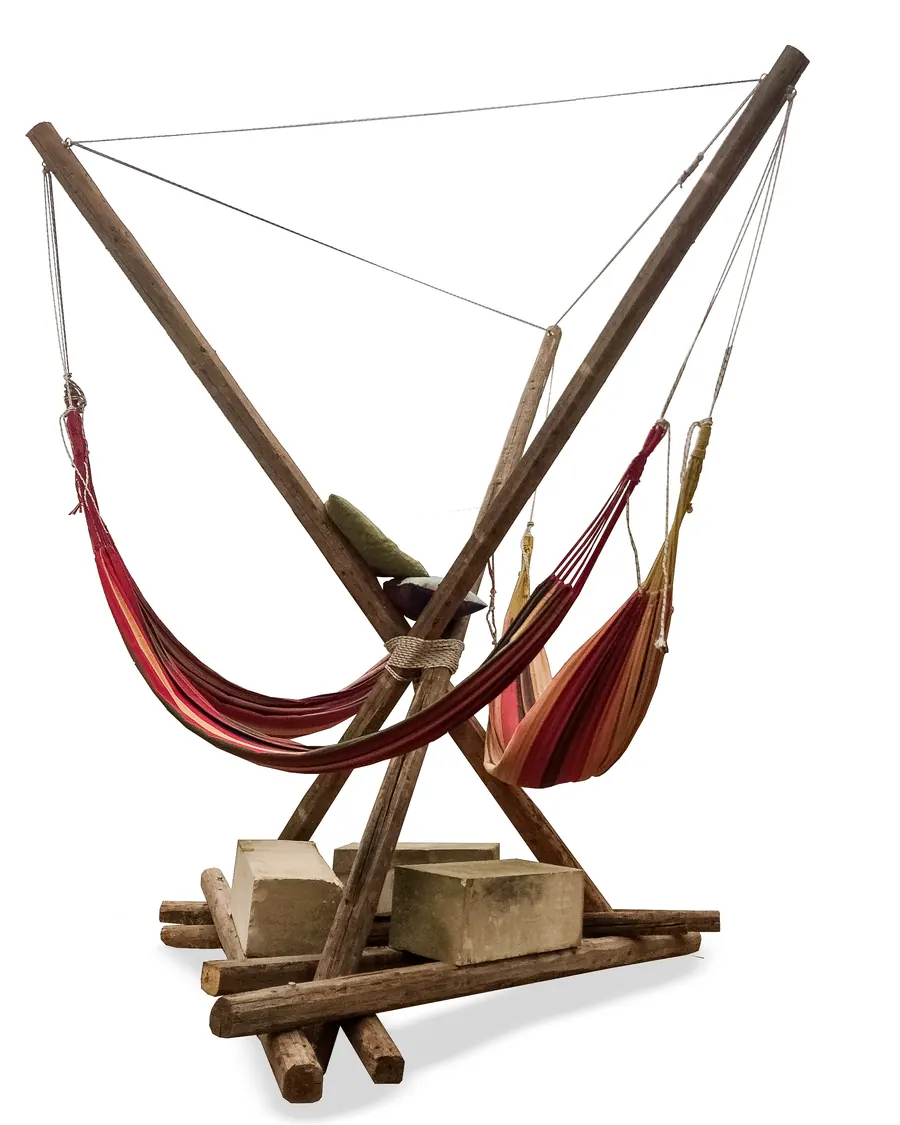 The same frame of chestnut poles with red striped hammocks